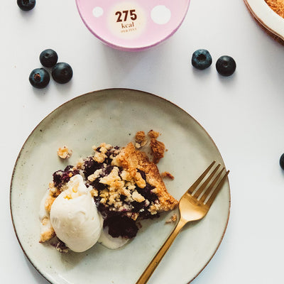 Healthy Bluebery pie with vanilla ice cream.