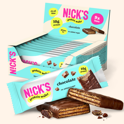 NICK'S chocolate protein wafers in a 9-pack display box with an individually wrapped bar