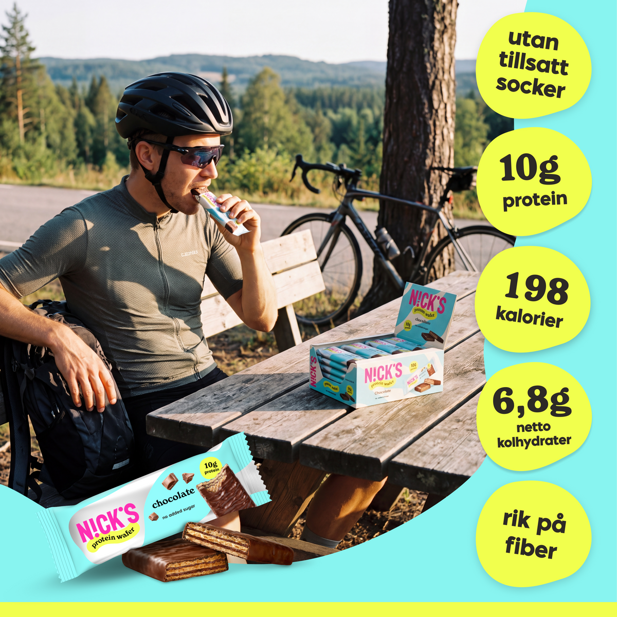 Cyclist enjoying a NICK'S chocolate protein wafer outdoors beside a bicycle