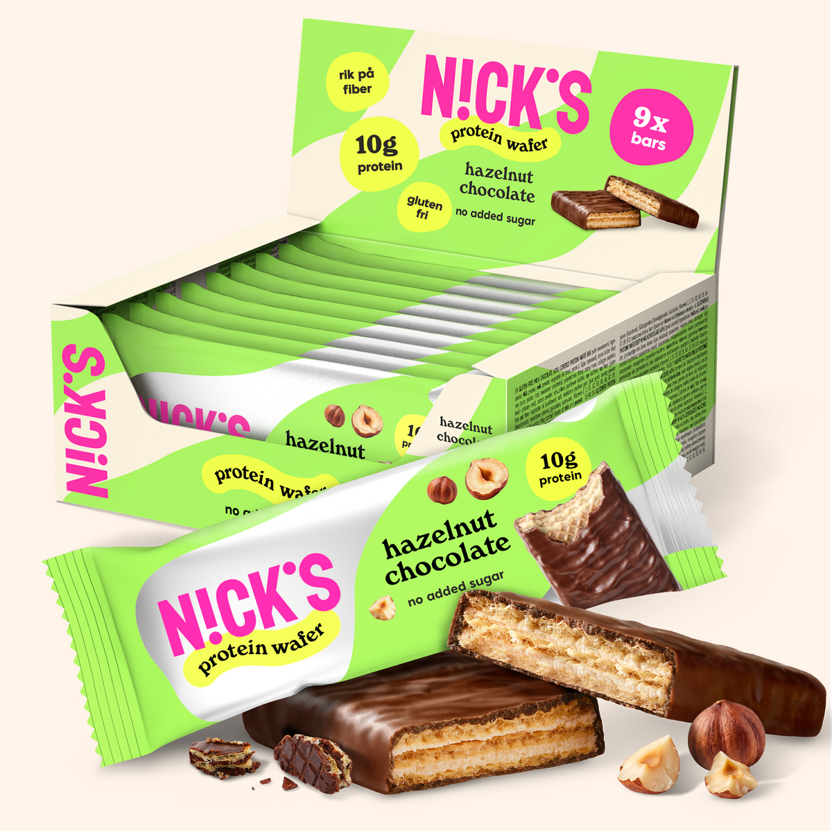 NICK'S Hazelnut Chocolate Protein Wafer 9-pack box with individually wrapped wafers and chocolate-coated wafer pieces.